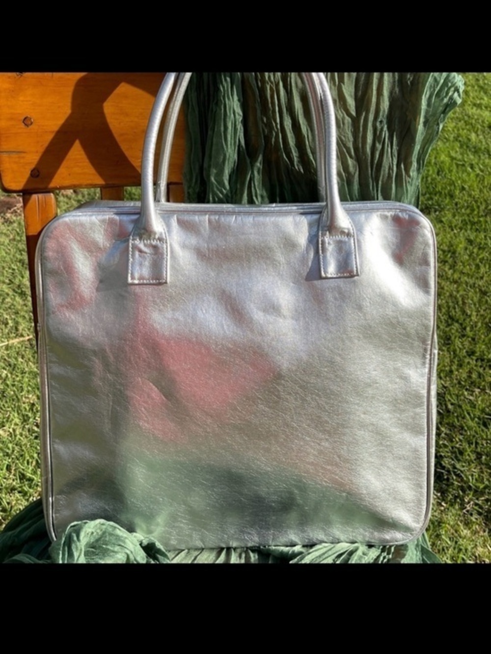 NWOT metallic silver laptop bag. Silver. 

 .